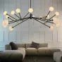 Люстра cо стеклянными плафонами на лучевом металлическом каркасе в скандинавском стиле