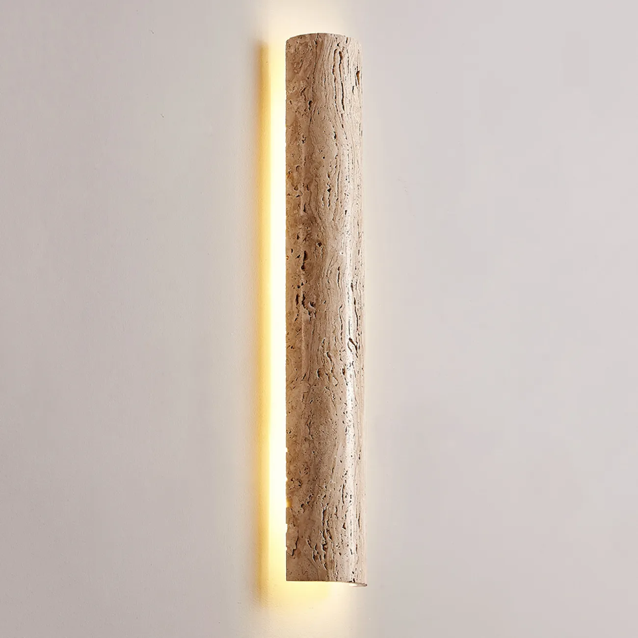 Серия настенных светодиодных светильников с вытянутым цилиндрическим корпусом из желтого камня травертина RAIKO L60 Серия настенных светодиодных светильников с вытянутым цилиндрическим корпусом из желтого камня травертина RAIKO L60