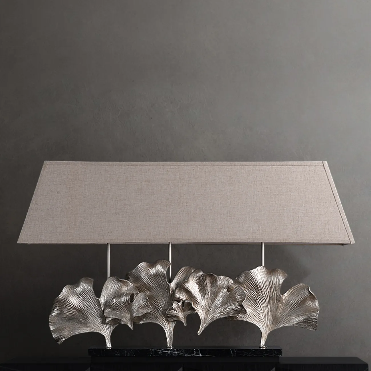 Серия настольных ламп с трапециевидным текстильным абажуром и декором в виде хромированных листьев гинкго на мраморном основании PHILOMENA L75