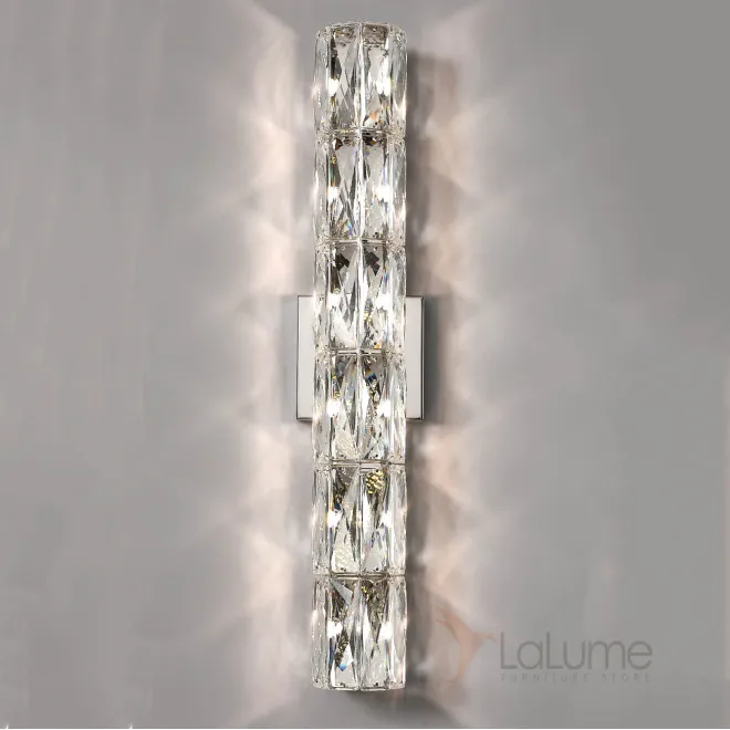 Серия настенных светильников с вытянутым цилиндрическим плафоном из прямоугольных хрустальных пластин MONNA H76 Серия настенных светильников с вытянутым цилиндрическим плафоном из прямоугольных хрустальных пластин MONNA H76