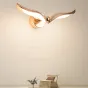 Серия настенных светодиодных светильников с изогнутыми плафонами, стилизованными под крылья птицы FLYER WALL L34