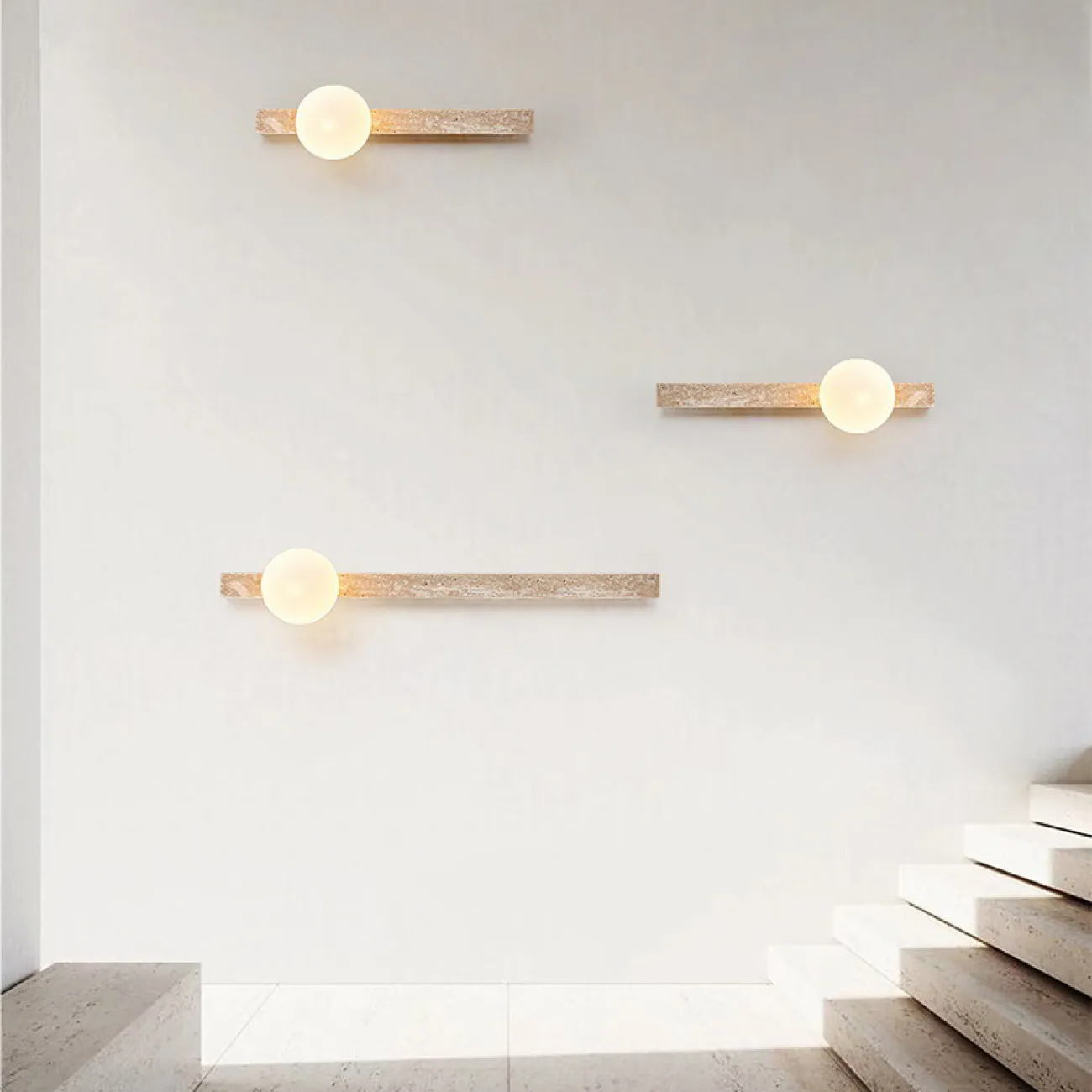 Серия настенных светильников с вытянутым прямоугольным корпусом из камня и шарообразным плафоном OBBE A L90 Серия настенных светильников с вытянутым прямоугольным корпусом из камня и шарообразным плафоном OBBE A L90