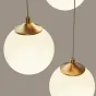 Готовая комбинация подвесных светильников с белыми матовыми плафонами шарообразной формы BARTA L62
