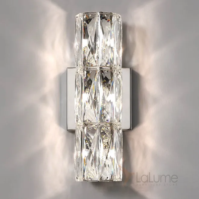 Серия настенных светильников с вытянутым цилиндрическим плафоном из прямоугольных хрустальных пластин MONNA H30 Серия настенных светильников с вытянутым цилиндрическим плафоном из прямоугольных хрустальных пластин MONNA H30