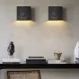 Серия настенных светильников с цементными плафонами кубической формы с круглым рельефом LEGEND Gray