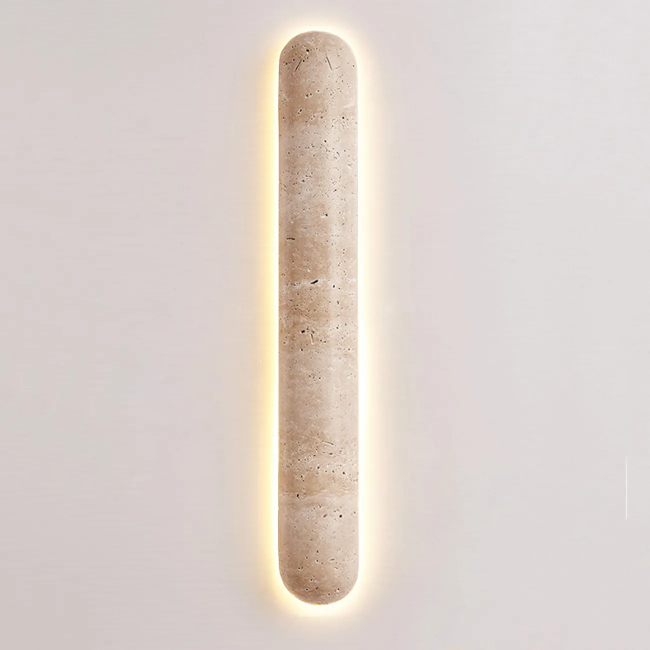 Серия настенных светодиодных светильников с вытянутым цилиндрическим корпусом из желтого камня травертина CASTIEL L35