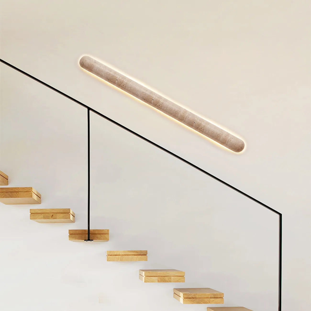 Серия настенных светодиодных светильников с вытянутым цилиндрическим корпусом из желтого камня травертина CASTIEL L35